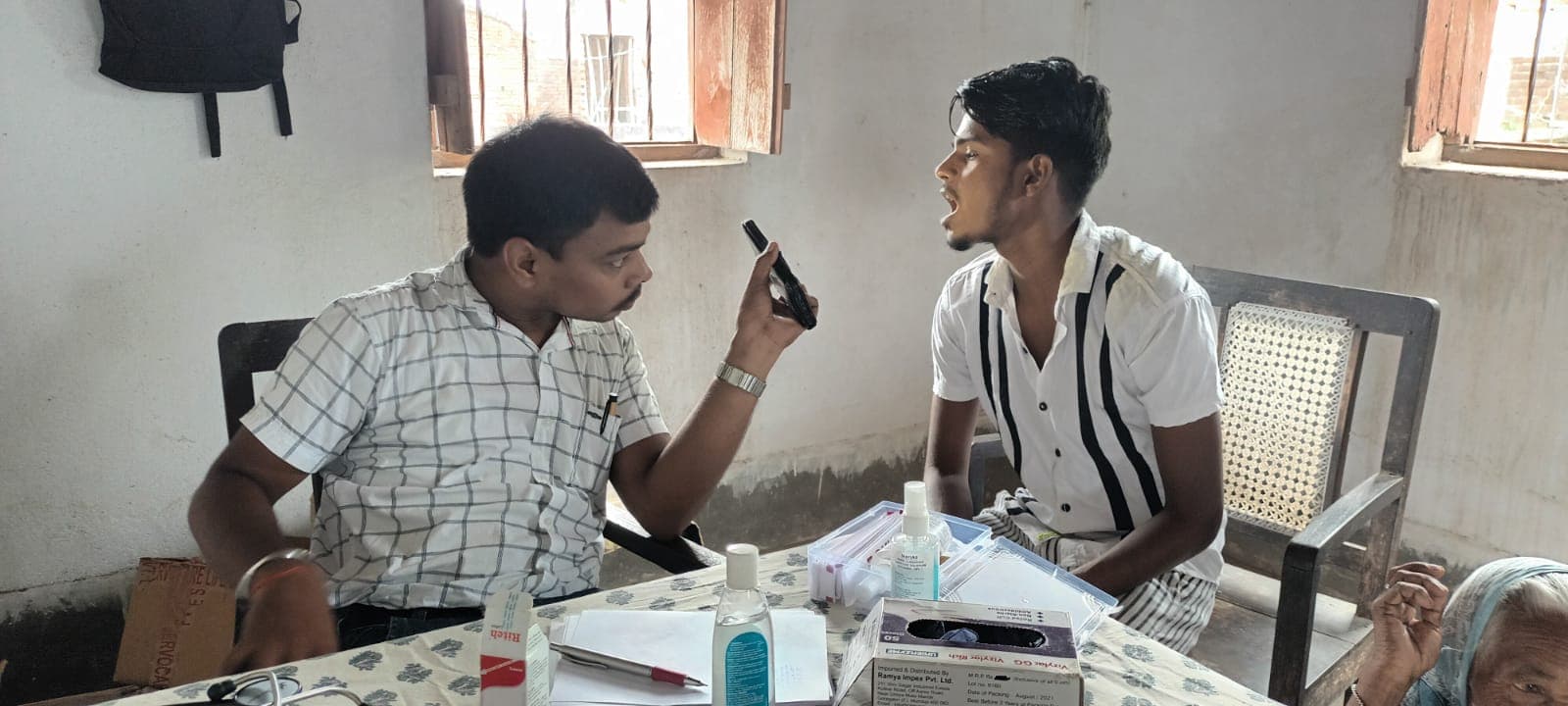 Indian doctor with a patient